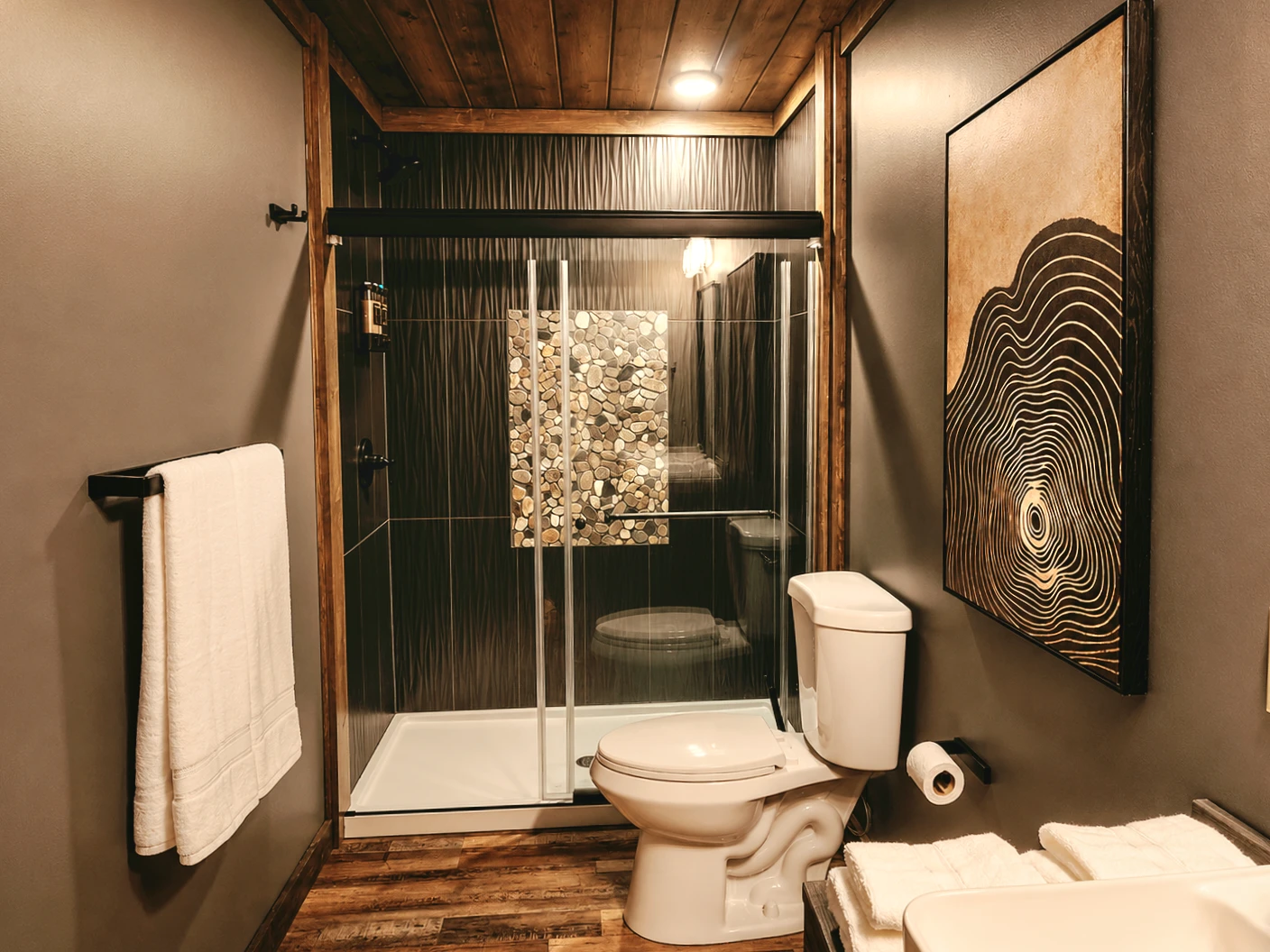 Bright private bathroom with tiled shower